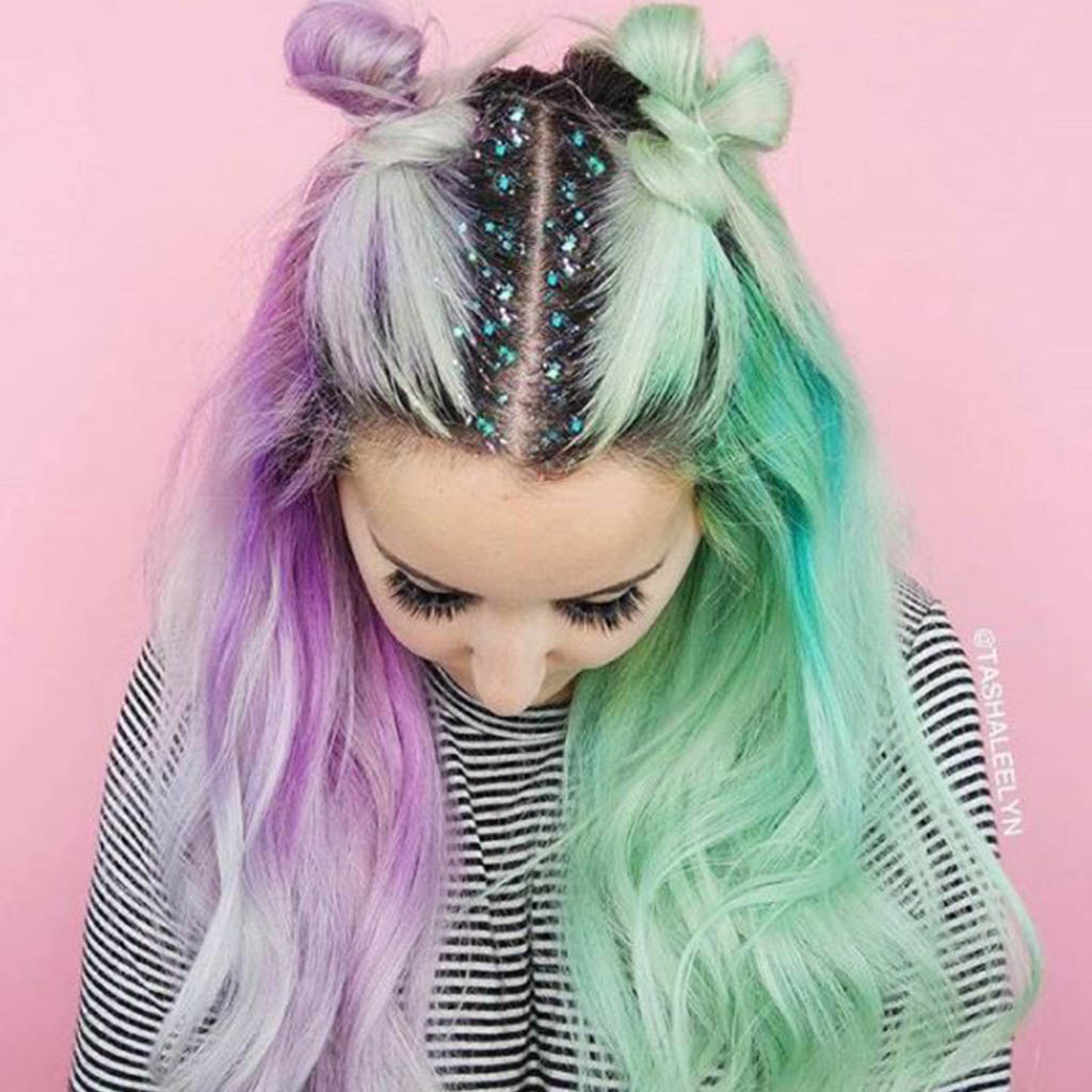 Creative Hair Women with glittery roots and flowing hair.