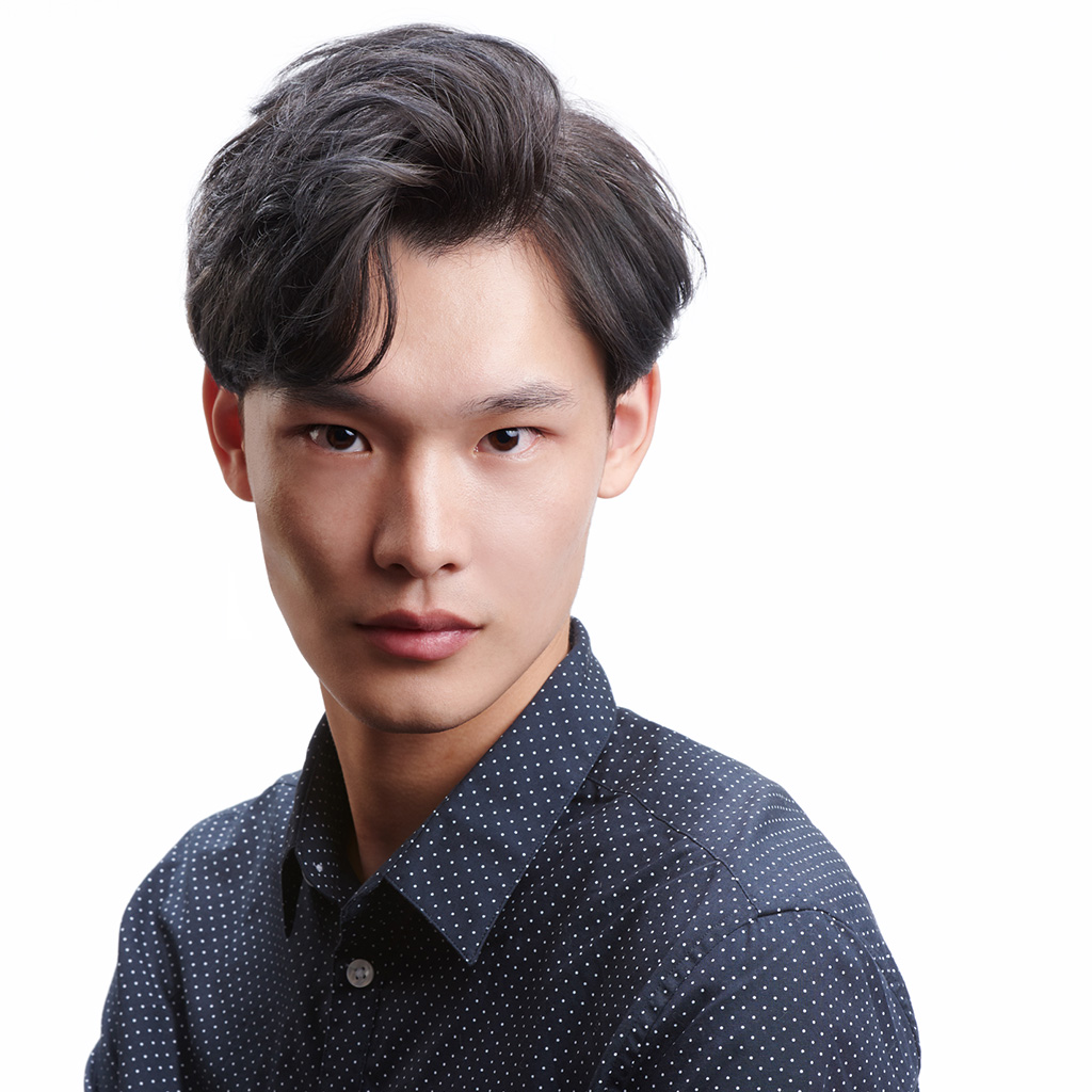 Korean man with side swept waves hairstyle