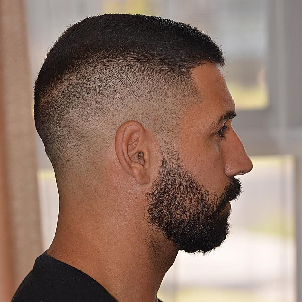 The Buzz Cut Fade Haircut For Men - A stylish buzz cut with a subtle fade.