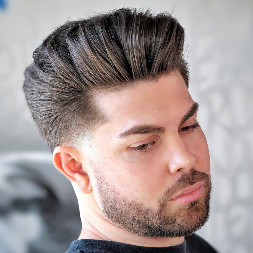 Temple Fade Haircut For Men - A subtle fade that focuses on the temples for a sleek appearance.