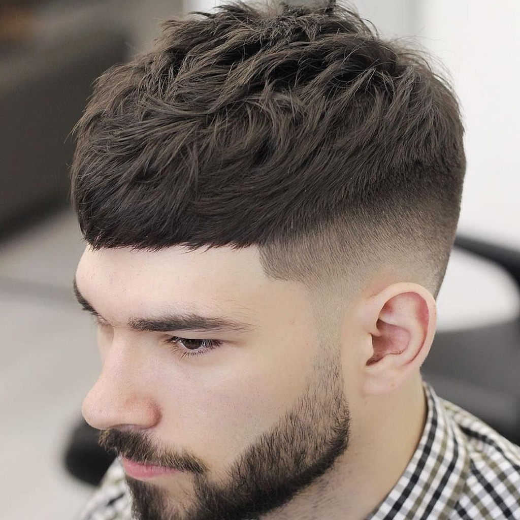 The Textured Crop Fade Haircut For Men - A contemporary crop cut with textured layers and a fade.