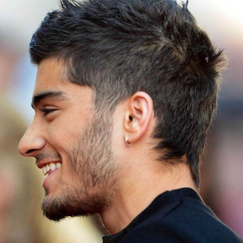 Zayn Malik flaunting a Mohawk with shaved designs hairstyles