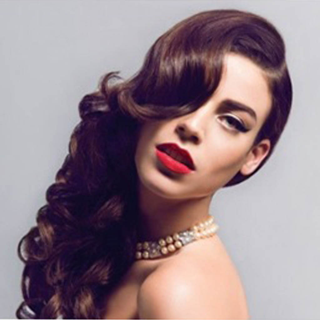 A red-carpet-worthy Women Cute Hairstyles with glamorous Hollywood curls, exuding elegance.