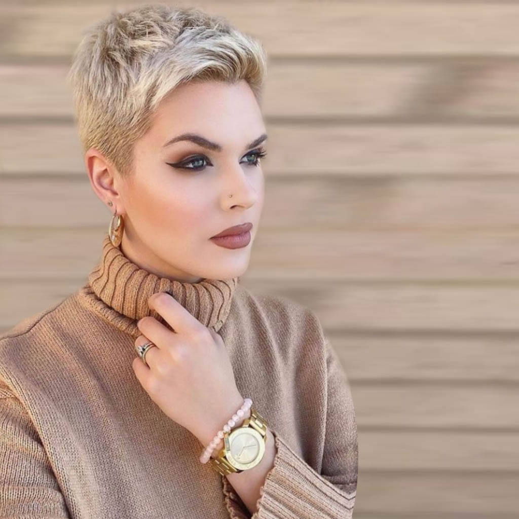 A bold pixie undercut Hairstyles with closely cropped sides and longer top.