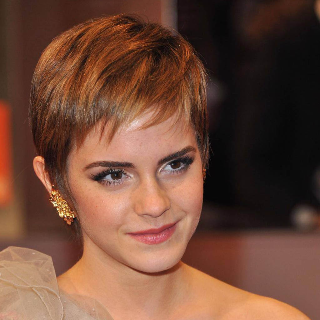 A woman with a trendy pixie cut.