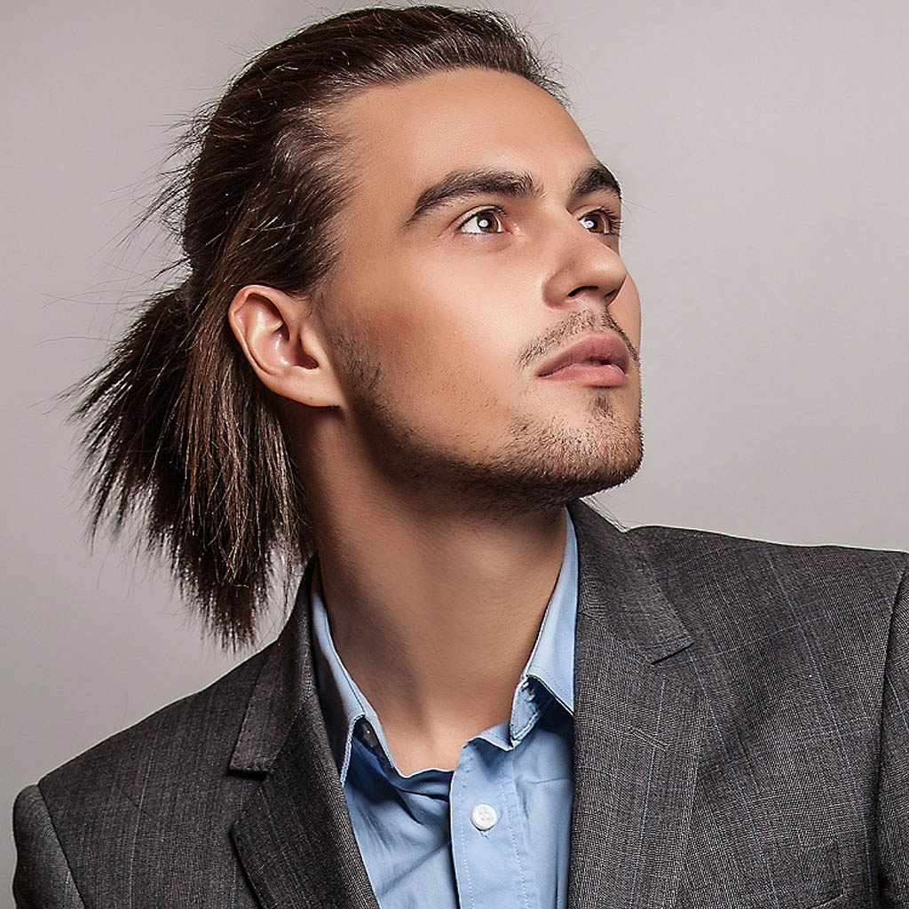 Man with a business-ready long hairstyle