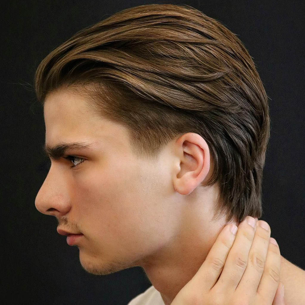 Man with a side part hairstyle