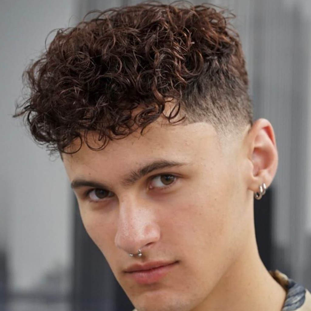 Undercut fluff hairstyle merged with texture for edgy appeal.