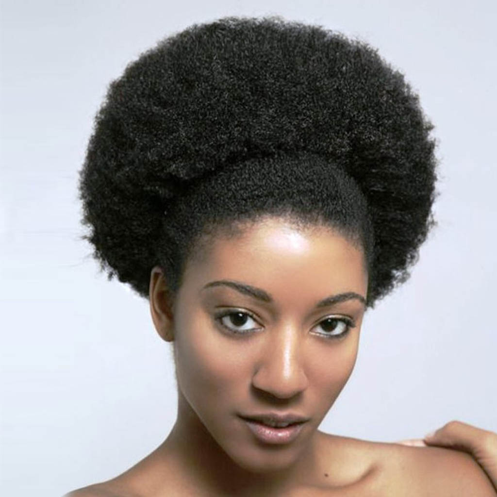 Confident woman showcasing her beautiful afro
