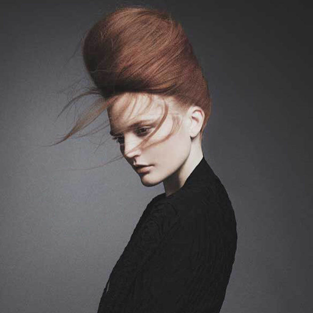A woman with an ethereal Wolf Cut Hairstyles, elevated with style