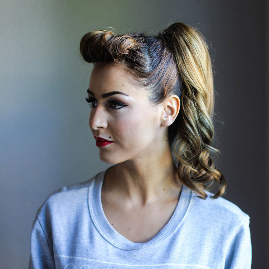 A woman embracing a vintage-inspired Wolf Cut Hairstyles